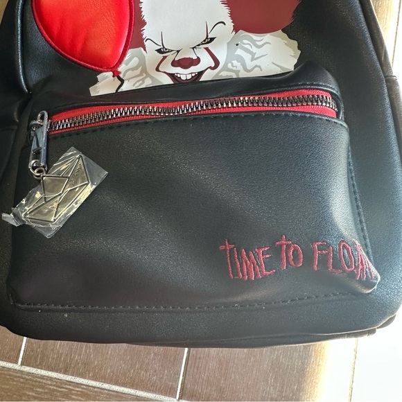 It Chapter 2 Pennywise Mini Backpack with Cardholders and Lapel Pin Set - Picture 5 of 6